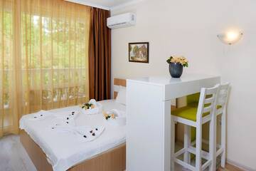 Фото номера Номер-студио с двуспальной кроватью Апарт-отели Villa Sardinia Apartments г. Свети-Влас 10
