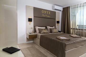 Фото номера Апартаменты с 1 спальней и балконом (2 взрослых + 2 детей) Отель Onyx Beach Residence г. Свети-Влас 5
